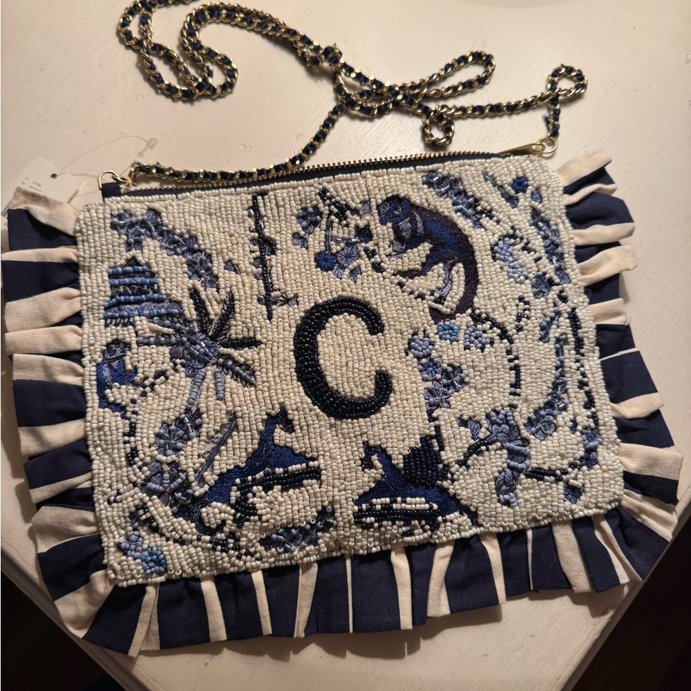 Anthropologie C navy beaded clutch